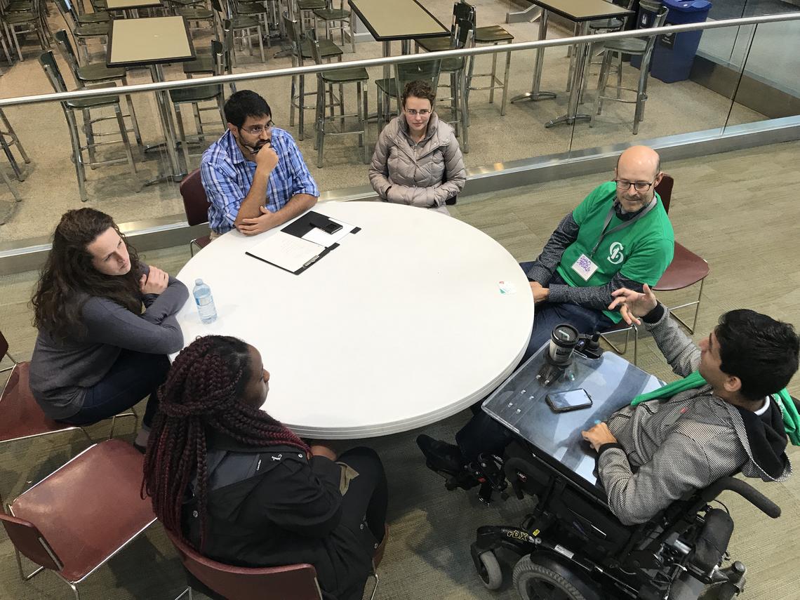 Nabeel Ramji mentors a team on the second day of the Interprofessional Challenge. 