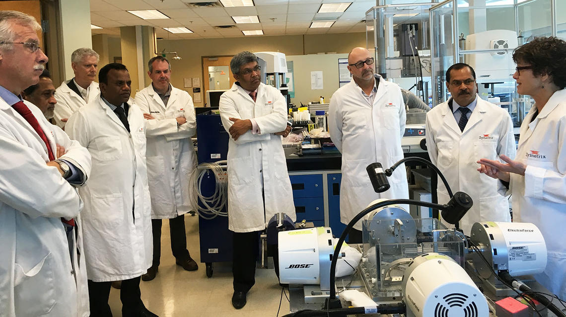 Janet Ronsky, far right, mechanical and manufacturing engineering, gives a tour to KSR delegates in the Zymetrix Lab