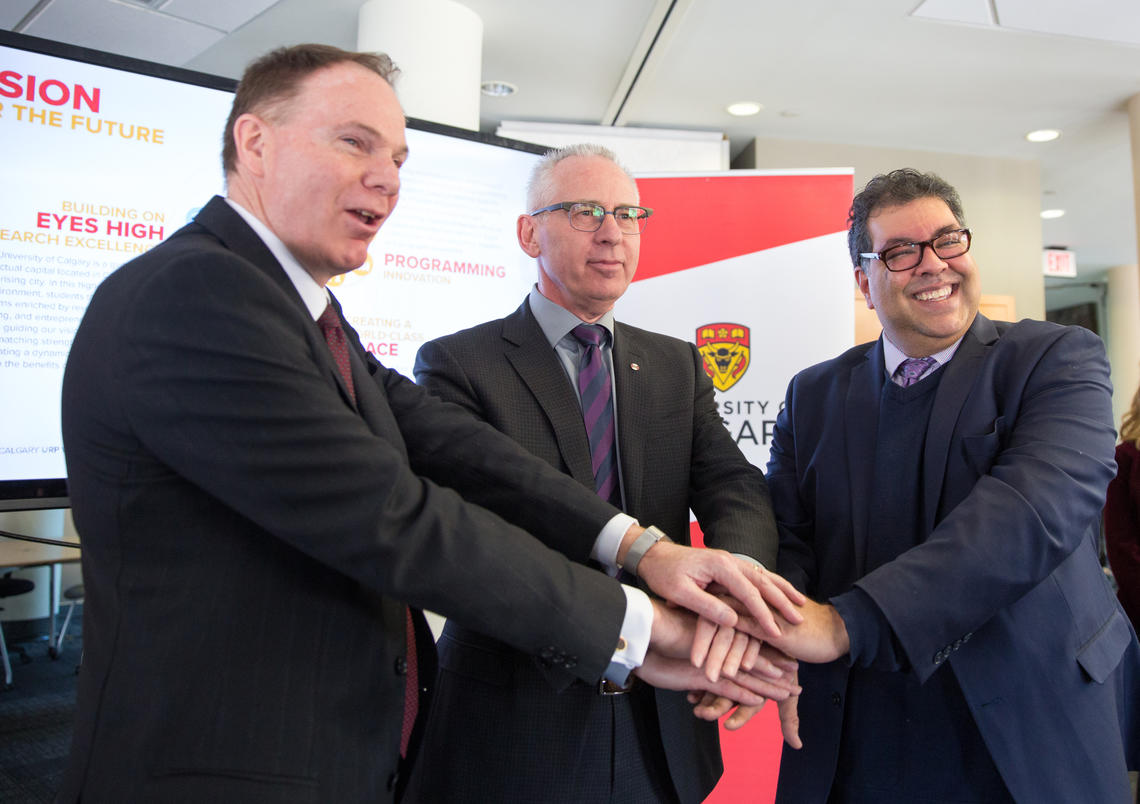 Barry Munro, Ed McCauley, and Naheed Nenshi announce $8.5 million in funding.