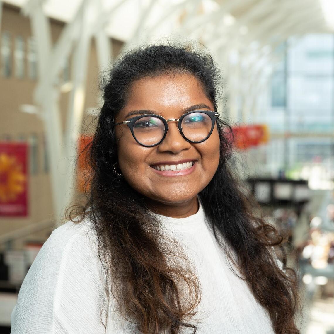 Photo of Anjali in the Azrieli atrium