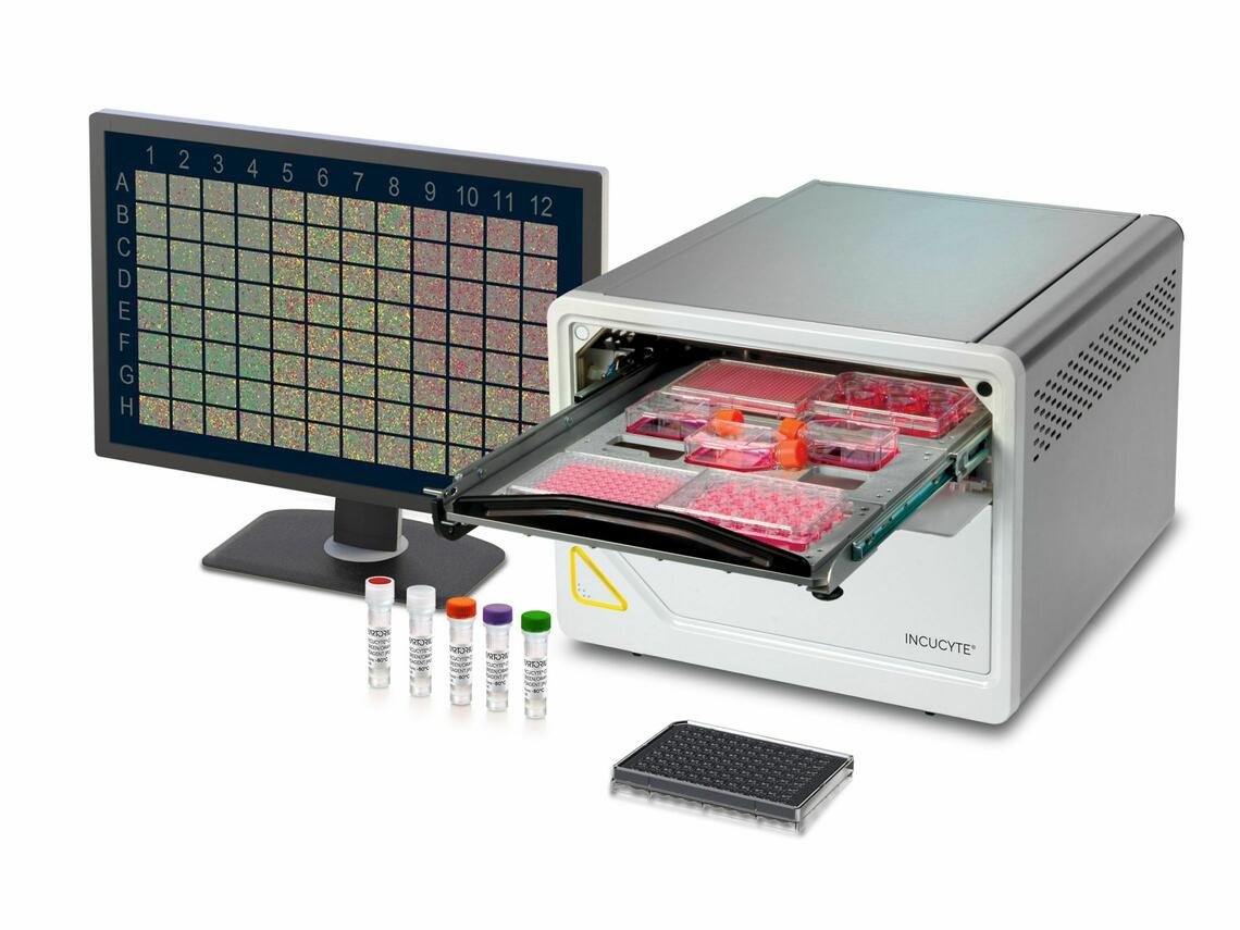 Image of Incucyte with computer and vials